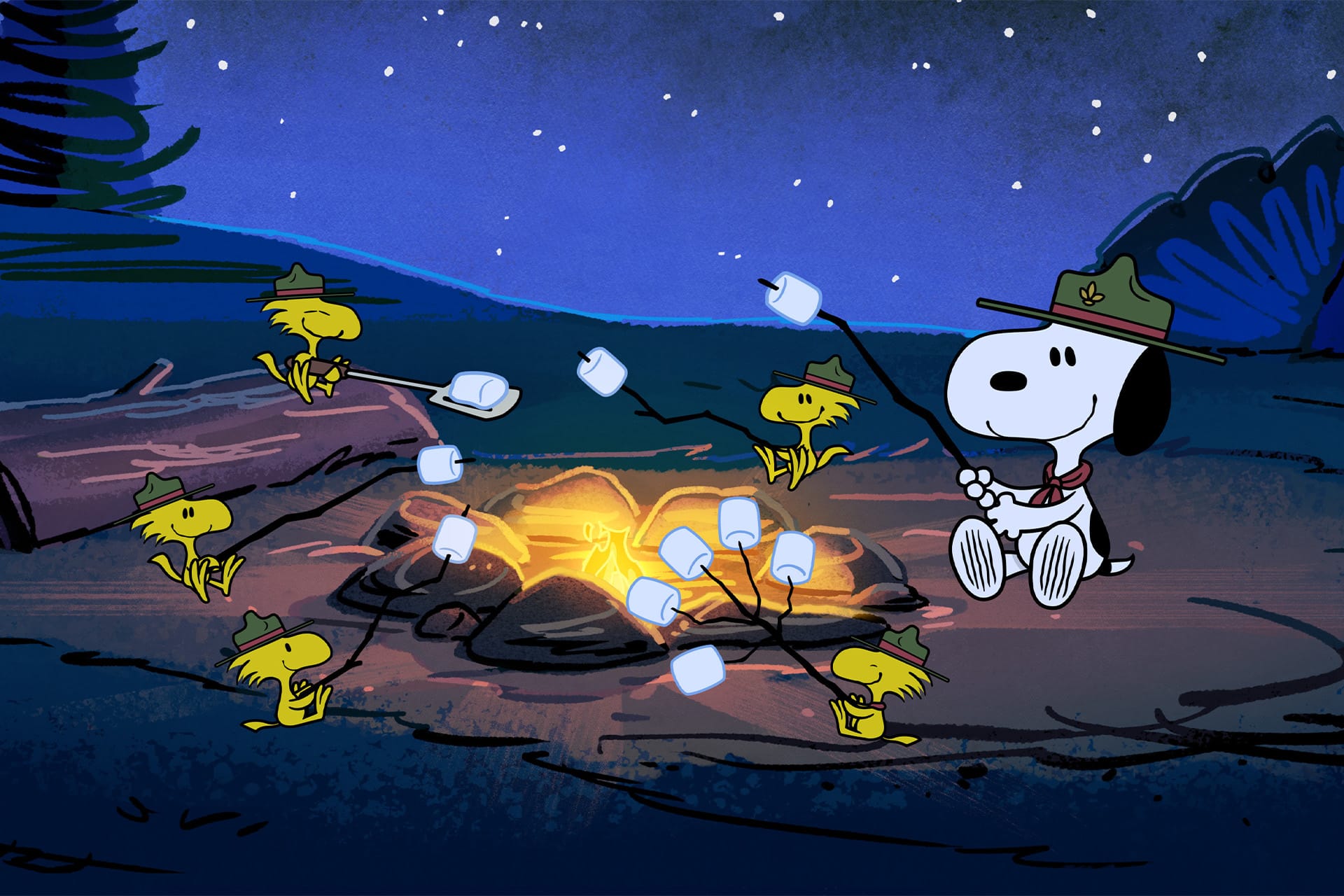 Snoopy and several yellow birds wearing scout hats roast marshmallows over a campfire at night in a forest, capturing a classic Peanuts moment sure to delight Charlie Brown fans and Apple TV viewers alike.