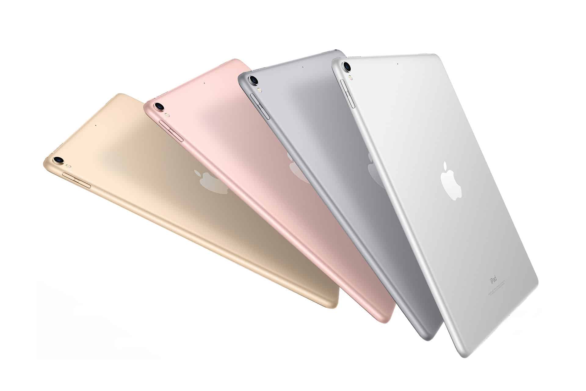 Four certified refurbished Apple iPads are shown in a diagonal row, each in a different color: gold, rose gold, gray, and silver, with the Apple logo and rear camera visible on each device.