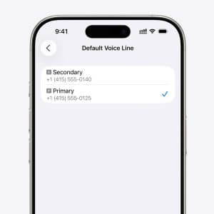 A smartphone screen displays the "Default Voice Line" settings page for iPhone eSIM, with two options: Secondary (work line) and Primary, each showing different phone numbers, and Primary is currently selected.