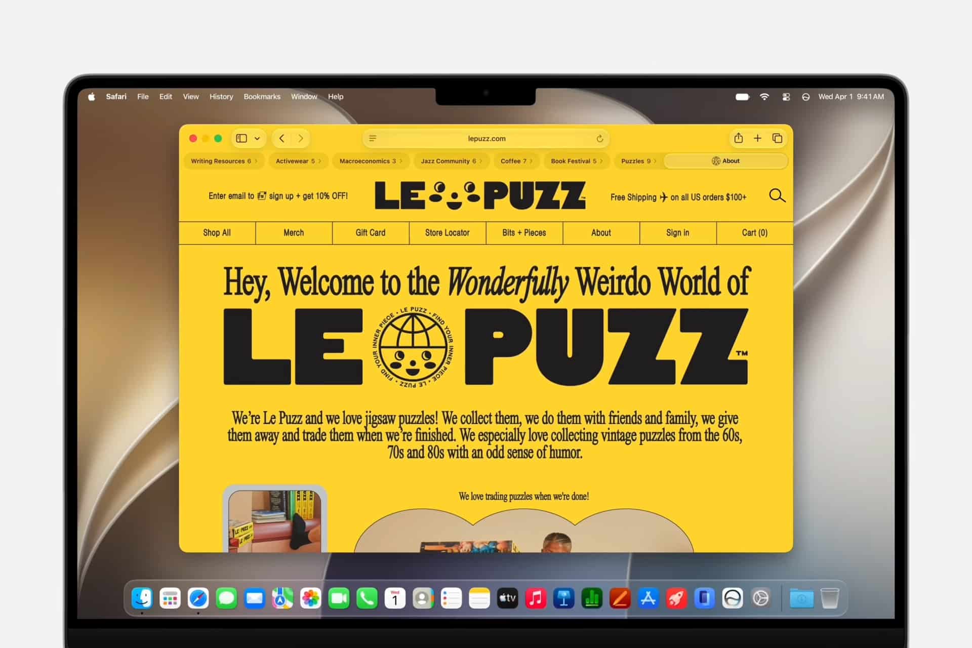 A laptop screen displays the LE PUZZ website in Safari tabs, featuring a bright yellow background, bold black text, and a circular logo. The site welcomes visitors to the “Wonderfully Weirdo World of LE PUZZ,” a jigsaw puzzle retailer.
