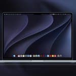A silver laptop powered by Apple silicon displays a dark abstract wallpaper with curved lines. Running macOS 27 Golden Gate, its screen shows several application icons along the bottom dock, with a blurred background in dark shades.