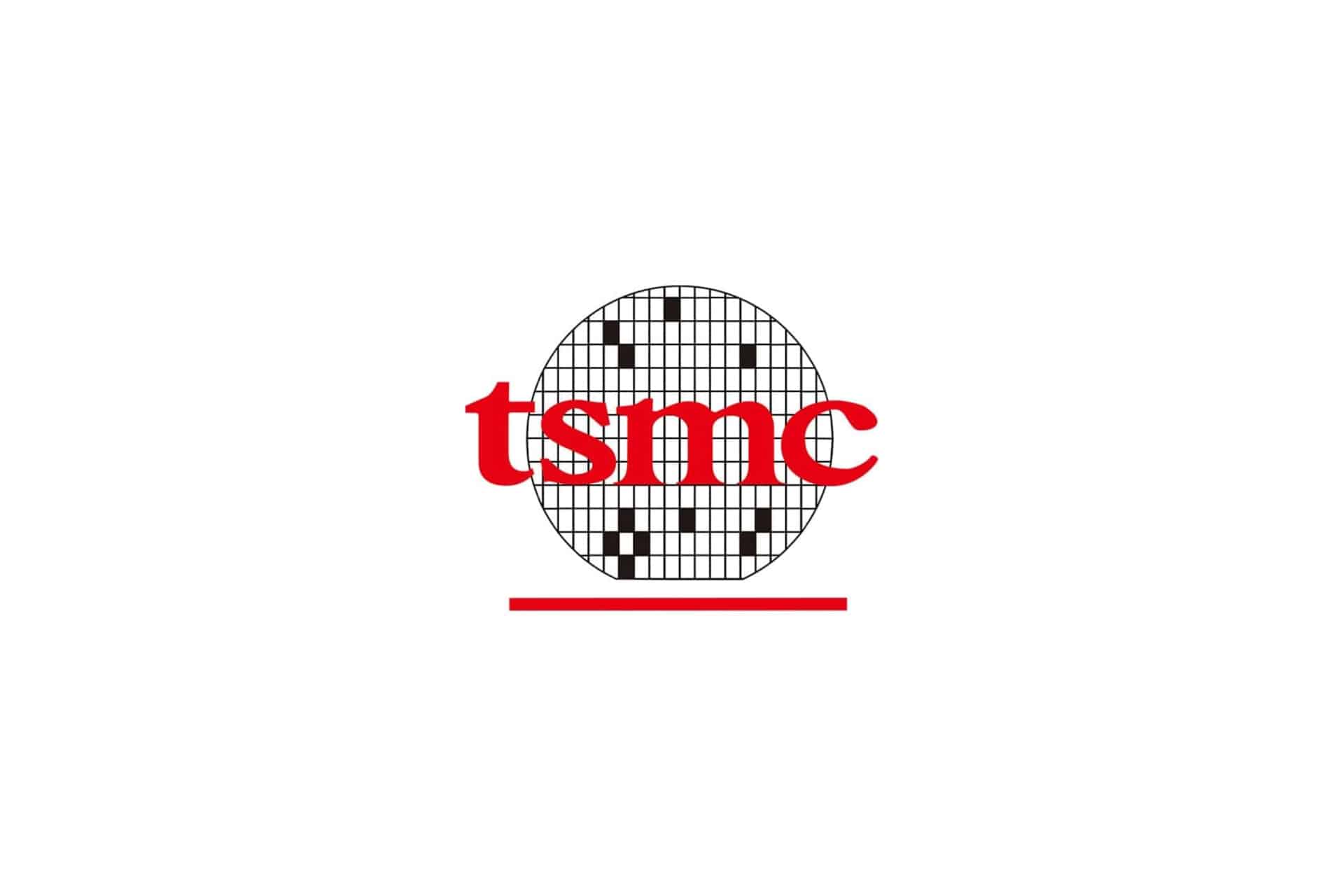 TSMC logo featuring the letters "tsmc" in bold red font over a stylized black and white semiconductor wafer, with a red horizontal line beneath—symbolizing rising TSMC AI chip demand in the tech industry.