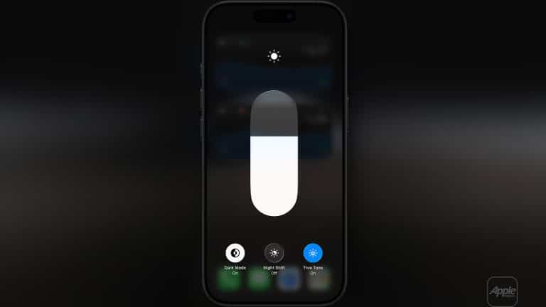 A smartphone screen shows the brightness control slider and options for Dark Mode, Night Shift, and True Tone settings, all turned off—similar to controls found on an Apple display. The Apple logo is visible in the bottom right corner.