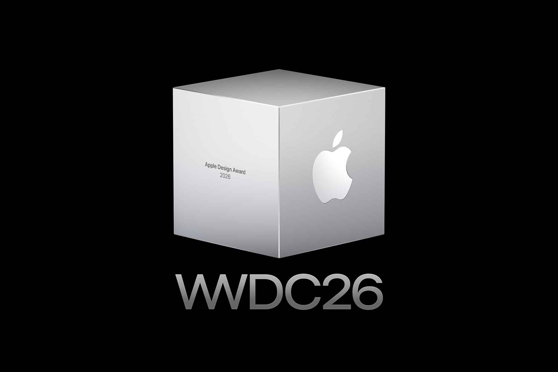A silver cube with the Apple logo and "Apple Design Award 2026" text on a black background. Below the cube, "WWDC26" appears in bold silver letters, celebrating excellence at the Apple Design Awards.
