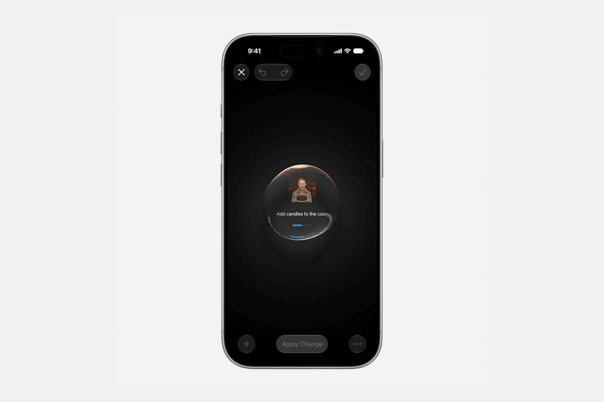 A smartphone screen displays a dark-themed app interface with a circular area in the center showing a person and the text "Add candles to the cake," inspired by Apple Intelligence features unveiled at WWDC26. Icons and buttons are visible at the top and bottom.