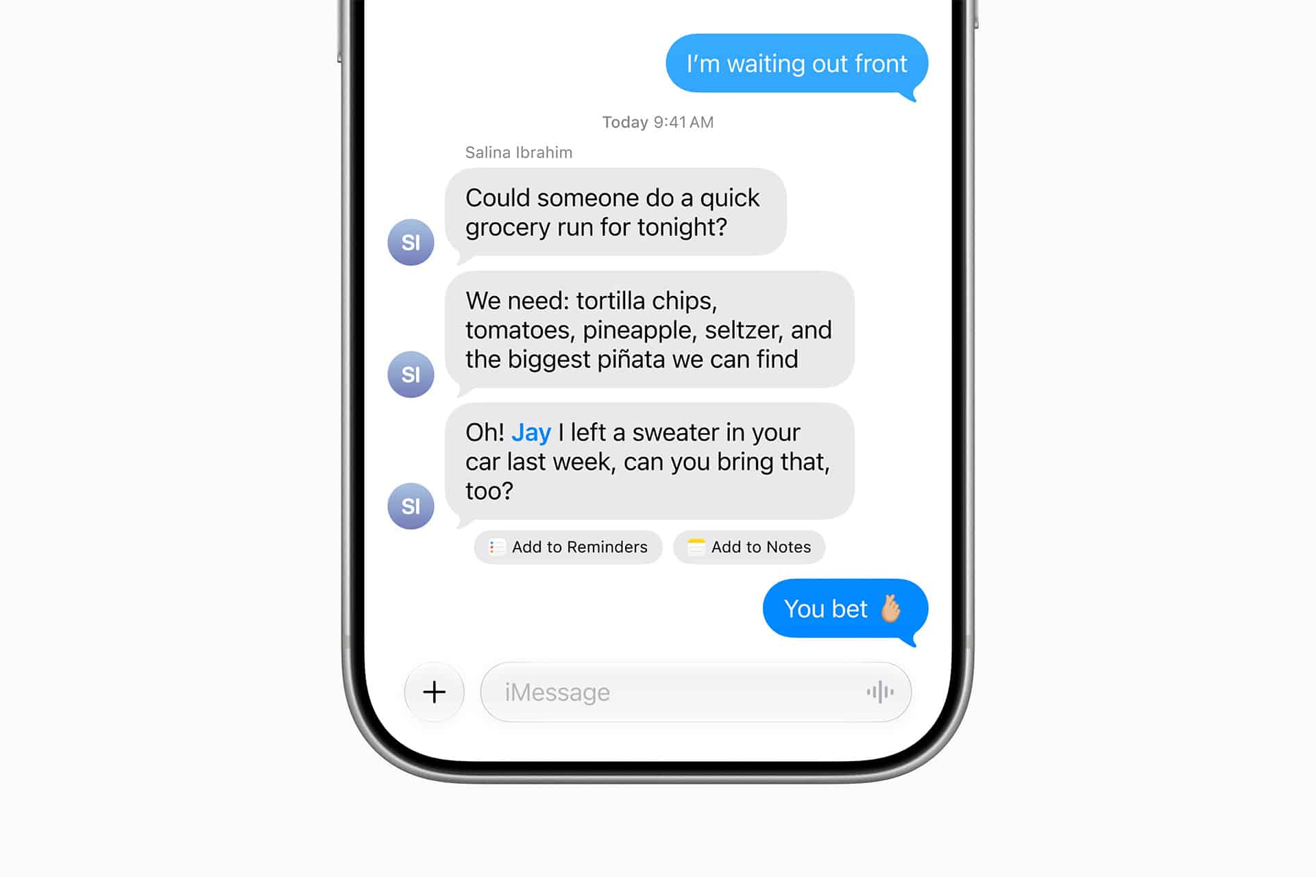 A smartphone screen displays a group text conversation in the Apple Messages app about buying groceries and bringing a forgotten sweater, with message reactions and app icons shown below the chat.