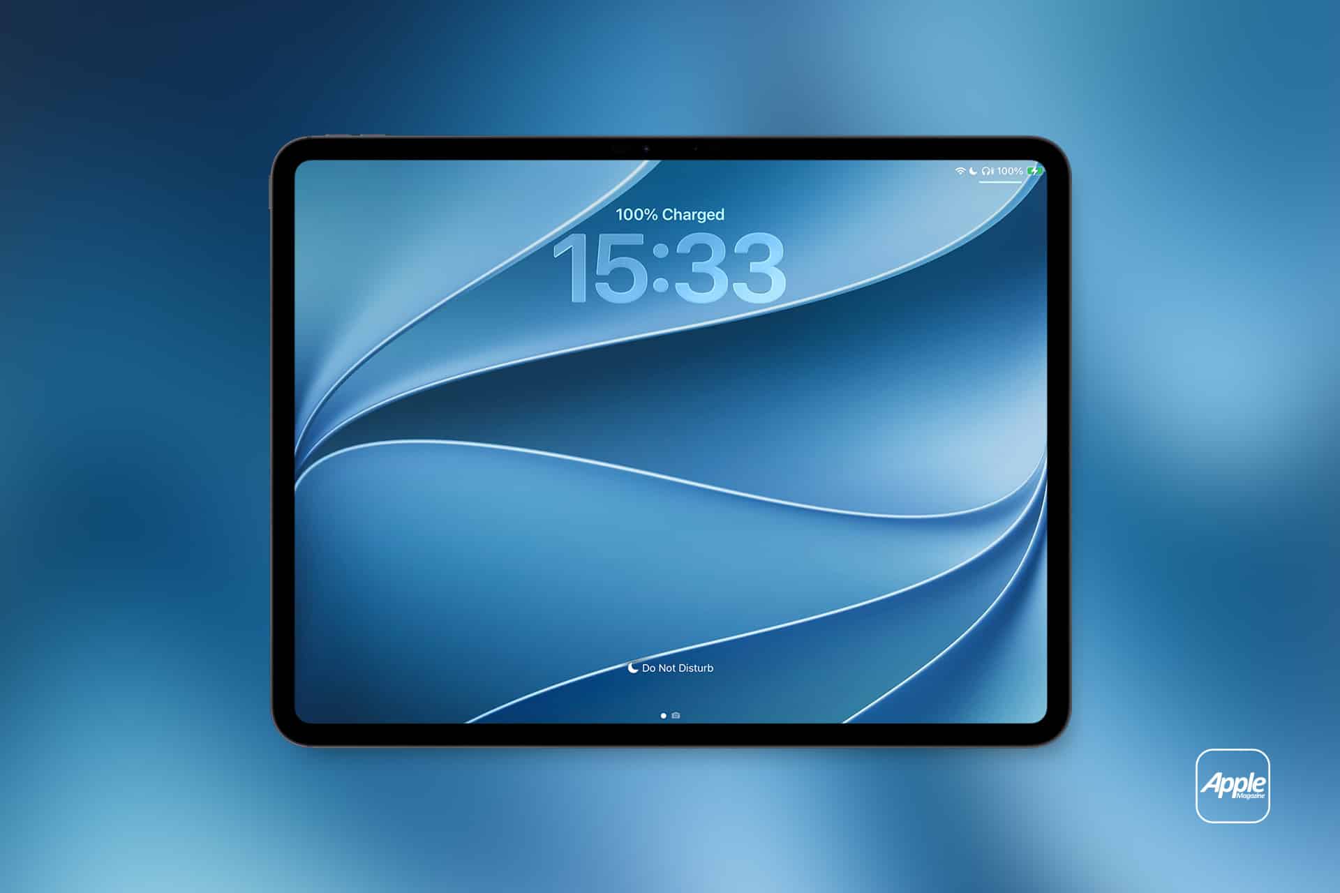 A tablet with a blue abstract iPad wallpaper displays a time of 15:33 and shows 100% battery charged. The background is a blue gradient, and an Apple logo is visible in the bottom right corner.