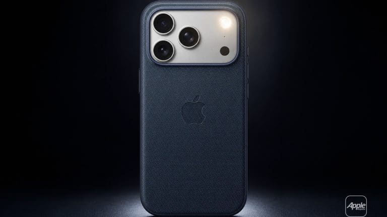 A dark blue Apple iPhone with three camera lenses and a textured case is shown upright against a dark background, spotlight illuminating the upper part. The Apple logo is visible, highlighting its LED flash alerts for iPhone calls.