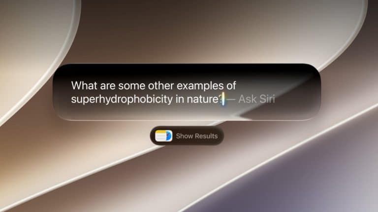 A digital interface on macOS 27 Golden Gate displays the text: "What are some other examples of superhydrophobicity in nature? – Ask Siri," with a "Show Results" button set against a smooth, abstract background in beige and gray tones.