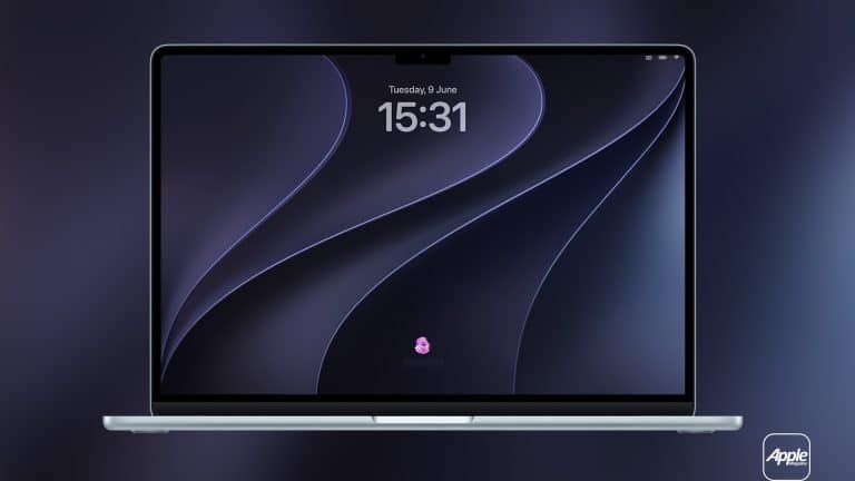 A silver Apple laptop with a dark abstract wallpaper on its screen, featuring the time 15:31 and date Tuesday, 9 June. The display showcases WWDC26 wallpapers on a blurred dark background, with an Apple logo in the bottom right corner.