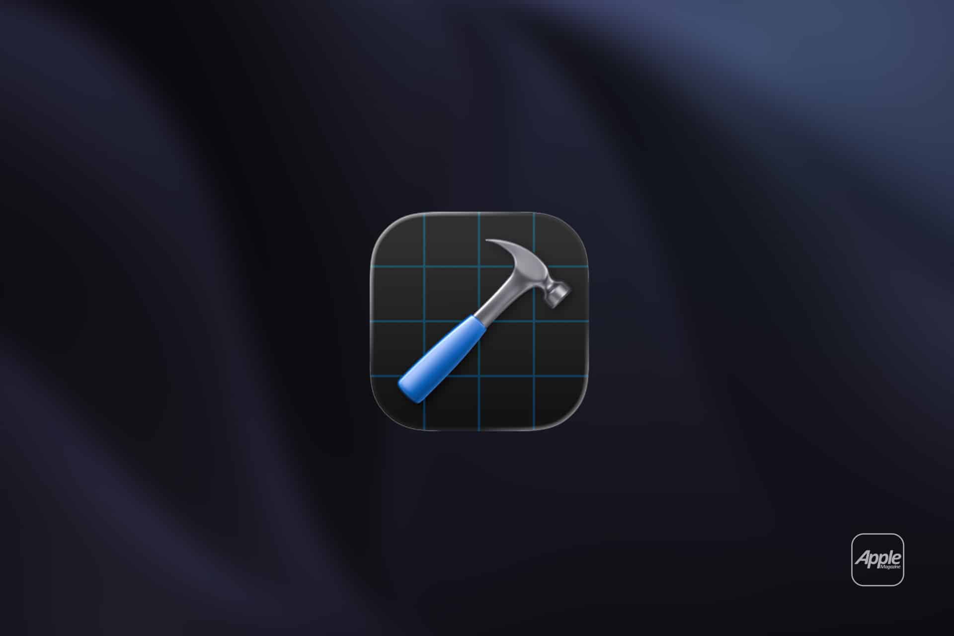 A digital icon of a hammer with a blue handle over a black grid background is centered on a dark, blurred surface. The Apple logo and "Apple" with "WWDC26" appear in the lower right corner, hinting at exciting news for Apple developers.