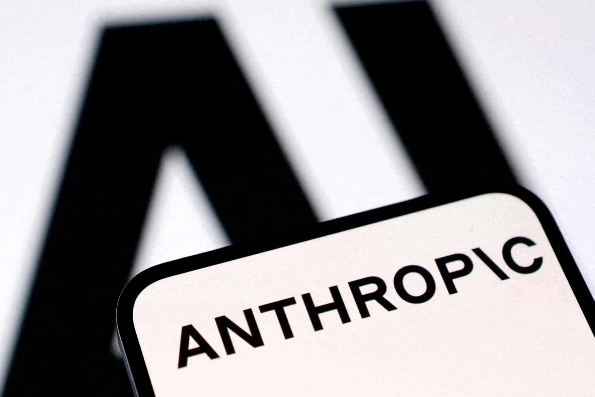 Claude Science - A smartphone screen displays the word "ANTHROPIC" with a bold, blurred "AI" in the background, highlighting the innovative essence of Claude AI.