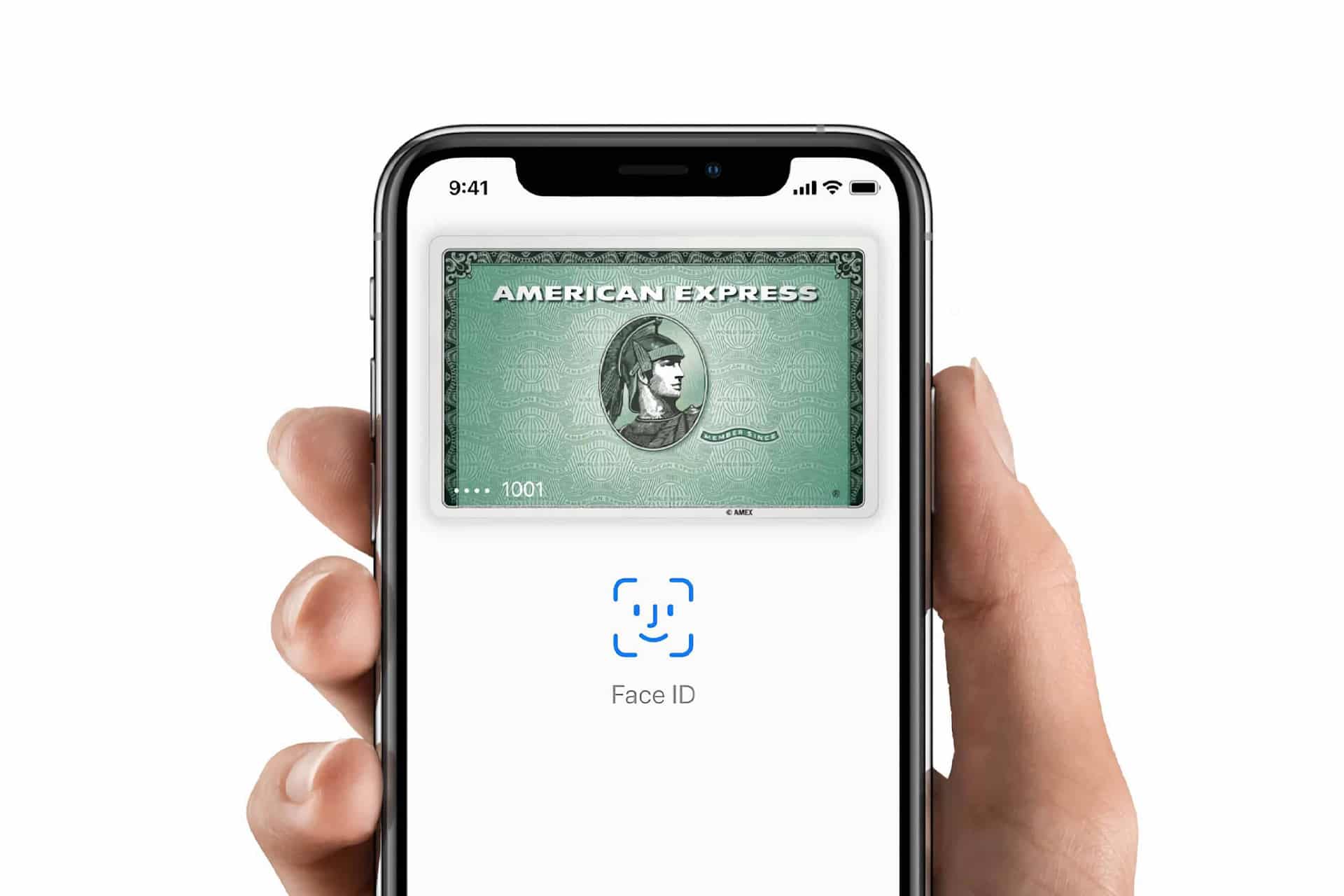 American Express points - A hand holds a smartphone displaying an American Express card and Face ID icon in Apple Wallet, suggesting secure biometric authentication for mobile payments.