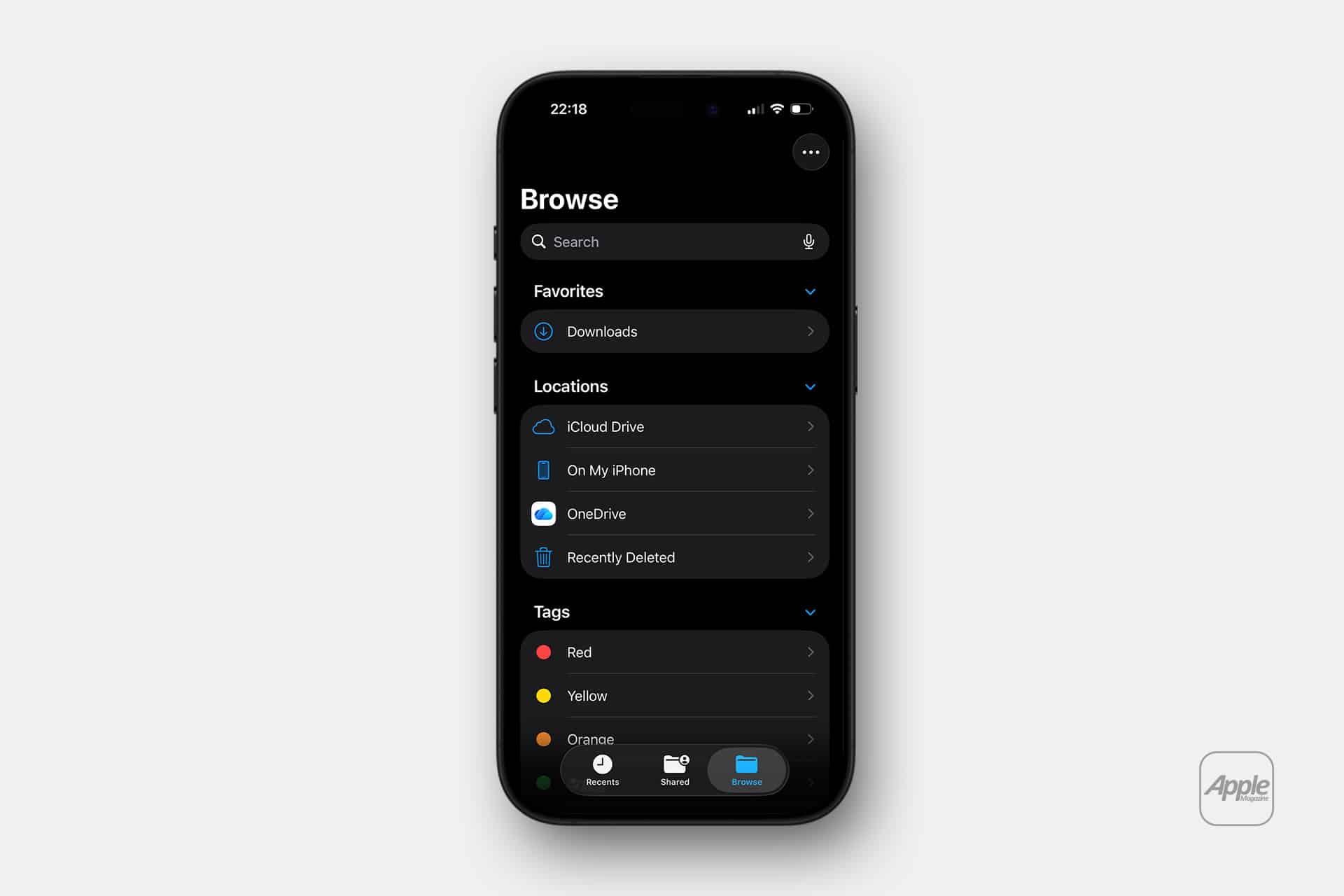 An iPhone screen displays the Files app in dark mode, showing the Browse tab with Favorites, Locations like iCloud Drive and OneDrive, and color tags—perfect for those moving from Android to iPhone or using Windows to iPad workflows. The Apple logo appears in the bottom right corner.