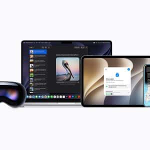 A set of Apple devices—laptop, tablet, smartwatch, smartphone, and headset—are displayed in a row on a white background, showcasing various apps and interfaces on their screens and highlighting the device longevity that Apple products are known for.