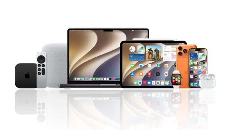 A collection of Apple products, including a MacBook, iPad, iPhone running the latest iOS 17 public beta from the Apple Beta Software Program, Apple Watch, AirPods, HomePod, and Apple TV, displayed on a reflective white surface.