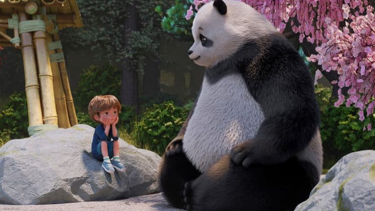 A young child sits on a rock, facing a large panda under pink cherry blossoms. Both appear relaxed, surrounded by trees and a bamboo structure in the background—a tranquil moment inspired by the animated series Stillwater, capturing the gentle wisdom and calm of Stillwater season 5.