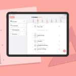 A tablet displays a digital planner for October 7, 2025, showcasing tasks and a calendar—perfect for digital planning enthusiasts. It rests on a spiral notebook and a pink triangular ruler, set against a pink background.