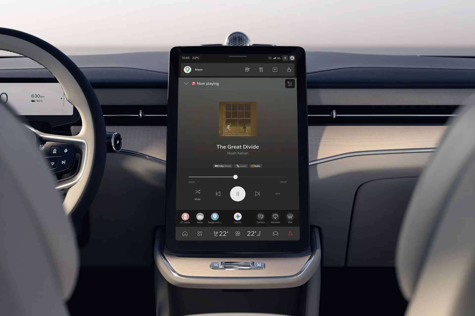 The center touchscreen inside a Volvo vehicle displays Apple Music, showing music playback controls and integrated in-car apps.
