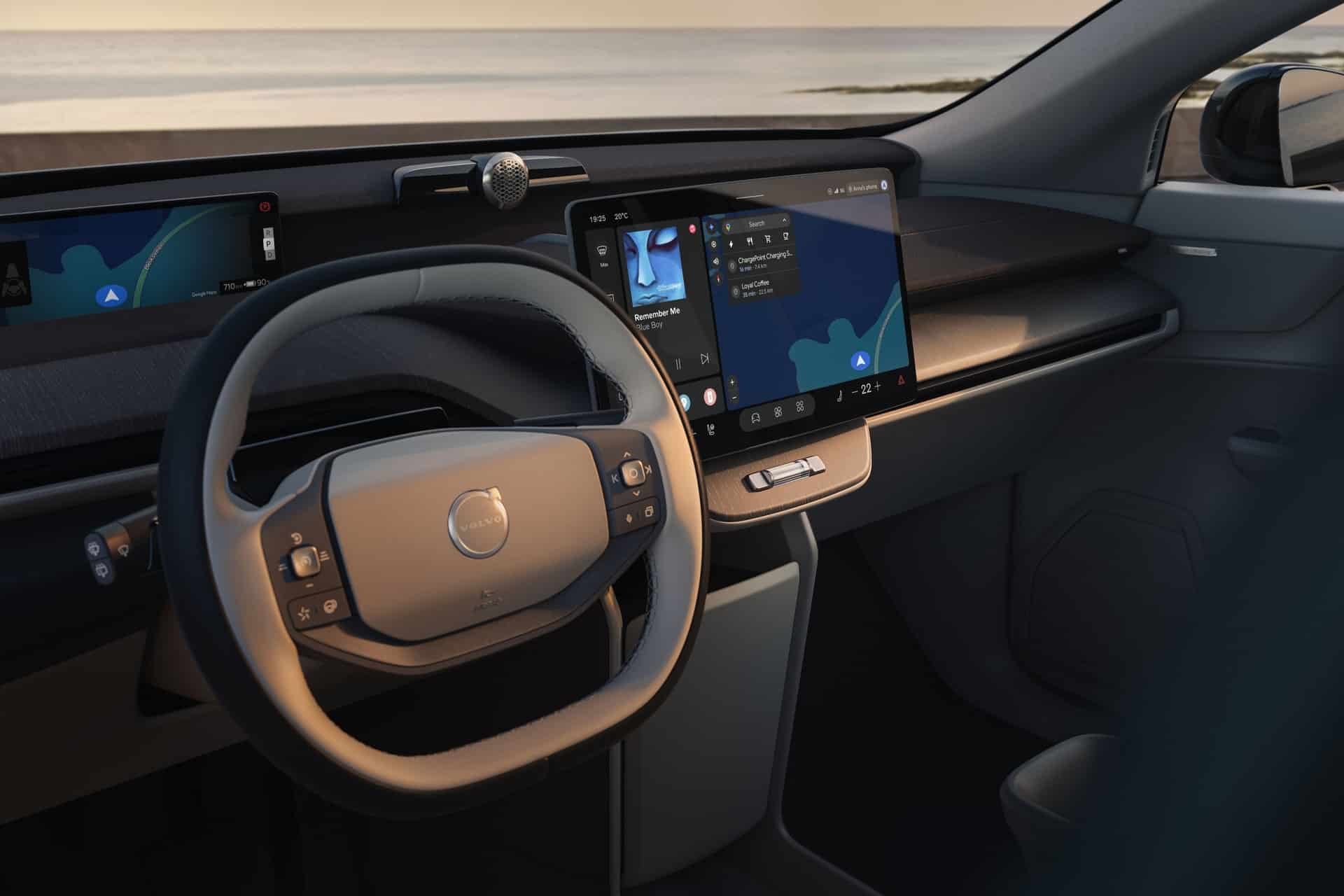 Interior of a Volvo vehicle featuring Apple Music on the central touchscreen alongside integrated navigation and vehicle controls.