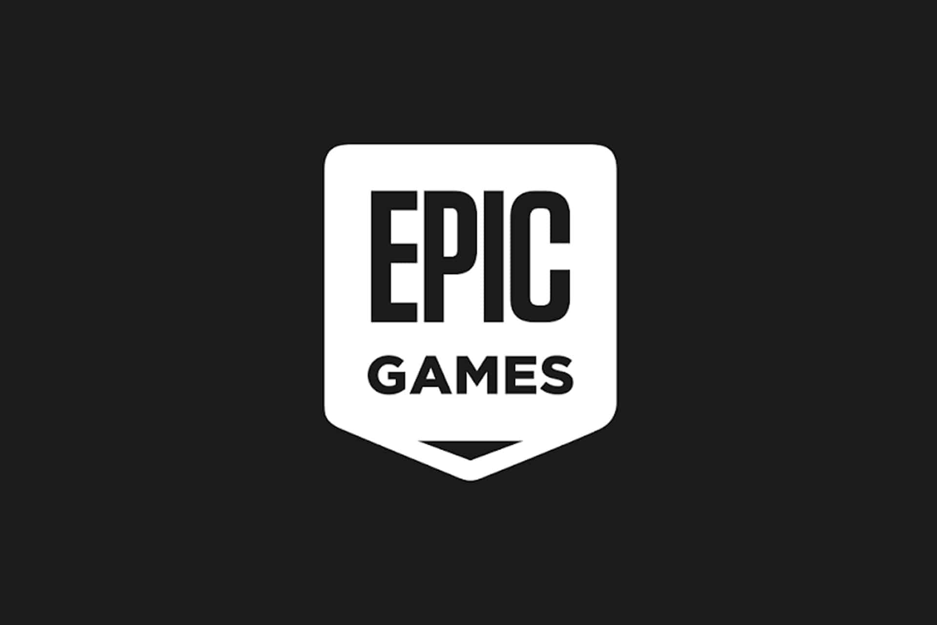 Epic Games logo featuring the words "EPIC GAMES" in bold, white capital letters on a black background, inside a white shield-shaped emblem—a symbol often seen amid debates over App Store fees.