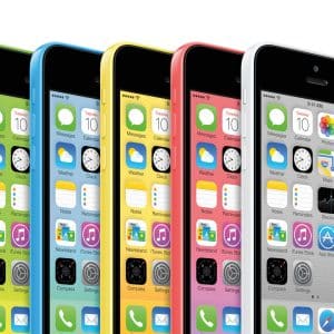 Five iPhones in green, blue, yellow, pink, and white are displayed side by side, each showing their home screens with app icons and the same time and date—a colorful nod to legacy iPhone models and their enduring appeal among enthusiasts interested in iOS signing or exploring features on older iPads.