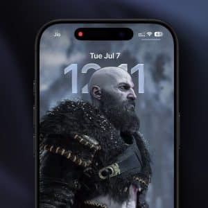 A smartphone screen displays the iPhone lock screen with a digital clock and date, featuring a bearded, armored warrior character as the wallpaper. The depth effect highlights the hero, while network and battery icons appear at the top.