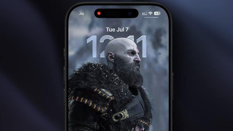 A smartphone screen displays the iPhone lock screen with a digital clock and date, featuring a bearded, armored warrior character as the wallpaper. The depth effect highlights the hero, while network and battery icons appear at the top.